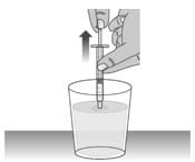Clean the Livmarli dosing dispenser by pulling back on the plunger slowly. to fill the dosing dispenser with water from the cup