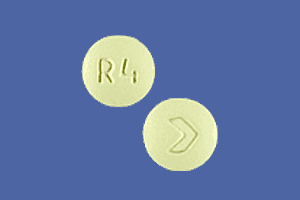 Image 1 - Imprint R4 > - risperidone 4 mg