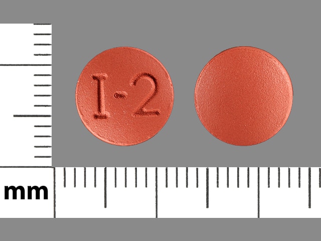 Pill Finder I 2 Brown Round Medicine